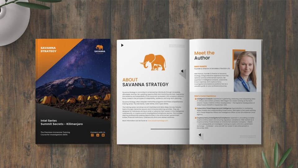 There is a leaflet on a wooden desk which reads About Savanna Strategy and Meet the Author.